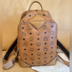 MCM Duke Visetos backpack in cognac coated canvas and leather.